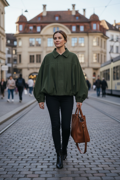 Native Swiss woman wearing the army green oversized jacket in Basel