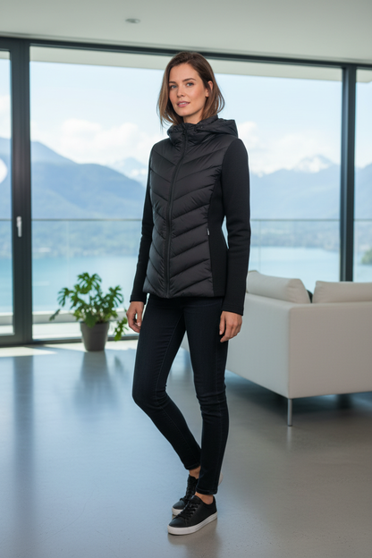 Native Swiss woman wearing the black hooded hybrid jacket in Lucerne