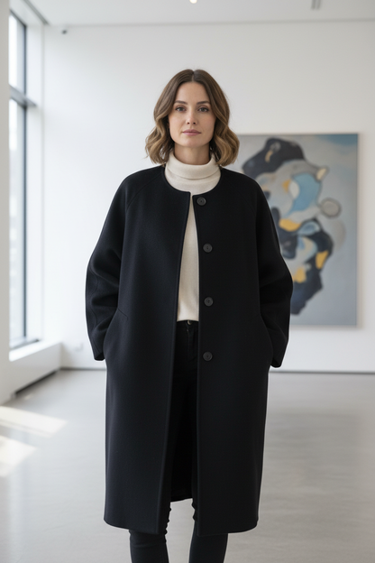 Native Swiss woman wearing black oversized coat